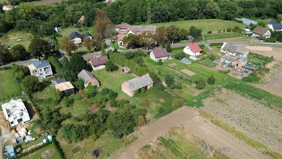 Działki 1,3550 HA oraz dom  i budynki gospodarcze